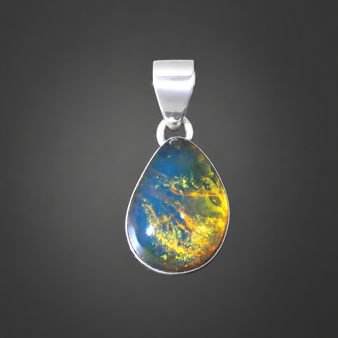 Clear deep blue Natural Dominican Amber teardrop 925 Sterling Pendant 29 mm